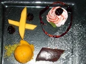 Rezept: Nougattarte an Mango-Vanillesorbet und Amarenasahne Nougattarte an Mango-Vanillesorbet und Amarenasahne - Rezept