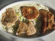 Überbackene Schnitzel in Sahne-Lauchsoße - Rezept