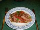 Linsensalat mit Tomaten und Schinken - Rezept