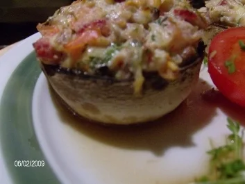 Champignon-Köpfe verschmelzen mit der Füllung - Rezept