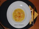 Ravioli mit Flusskrebs-Ricotta-Füllung und Kurkuma-Sahne-Sauce - Rezept