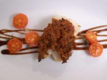 Rotbarsch mit Chorizokruste an geschmorten Tomaten - Rezept