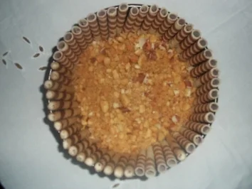 Rezept: Schokoröllchen-Torte mit Apfelmus Schokoröllchen-Torte mit Apfelmus - Rezept