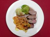 Salzwiesenlammlachse mit Wirsingbällchen und Steinpilz-Kartoffelgratin - Rezept