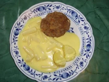 Rezept: Schwarzwurzel mit Hollandaise und Bouletten Schwarzwurzel mit Hollandaise und Bouletten - Rezept
