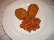 Rezept: Gefüllte Reiskroketten aus dem Süden Italiens Gefüllte Reiskroketten aus dem Süden Italiens - Rezept