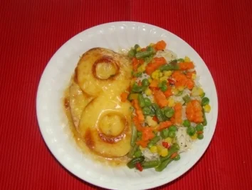 Rezept: Putenschnitzel überbacken mit Ananas und Käse Putenschnitzel überbacken mit Ananas und Käse - Rezept