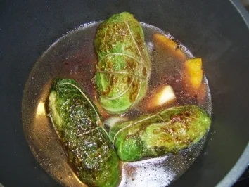 Rezept: Gefüllte Hühnerbrust im Wirsingblatt Gefüllte Hühnerbrust im Wirsingblatt - Rezept