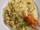 Rezept: Tagliolini mit Flusskrebsfleisch in scharfer Curry-Chilisoße an Gemüsejulienne Tagliolini mit Flusskrebsfleisch in scharfer Curry-Chilisoße an Gemüsejulienne - Rezept