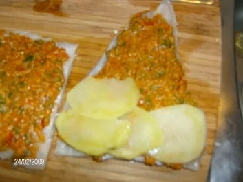 Seelachsfilet mit Tomaten-Parmesan-Kruste und einem neuen Schuppenkleid - Rezept