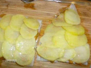 Seelachsfilet mit Tomaten-Parmesan-Kruste und einem neuen Schuppenkleid - Rezept