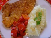 Paprika-Putenschnitzel mit knuspriger Chips-Panade - Rezept