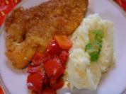Paprika-Putenschnitzel mit knuspriger Chips-Panade - Rezept