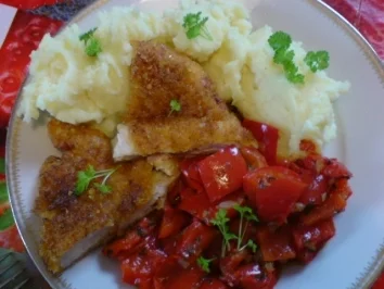 Rezept: Paprika-Putenschnitzel mit knuspriger Chips-Panade Paprika-Putenschnitzel mit knuspriger Chips-Panade - Rezept