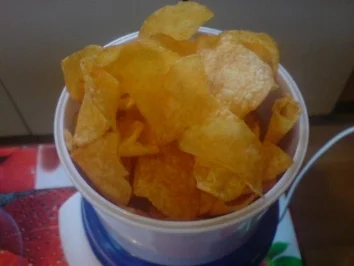 Rezept: Paprika-Putenschnitzel mit knuspriger Chips-Panade Paprika-Putenschnitzel mit knuspriger Chips-Panade - Rezept