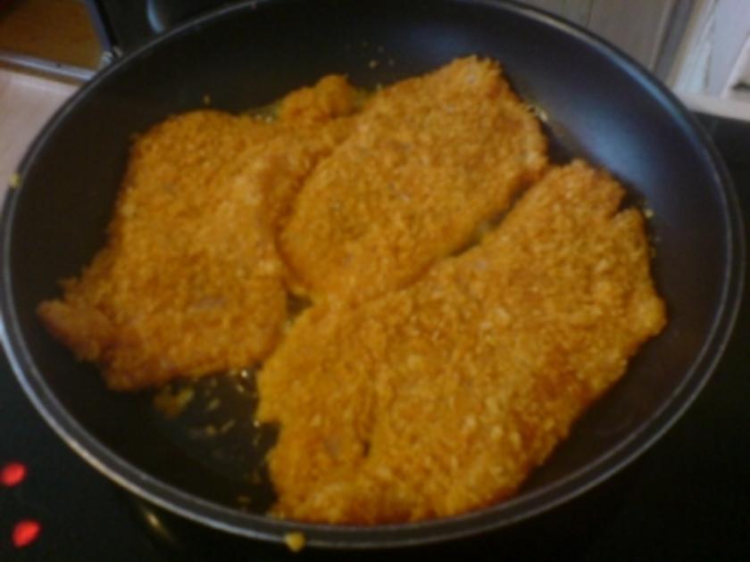 Paprika-Putenschnitzel mit knuspriger Chips-Panade - Rezept - kochbar.de