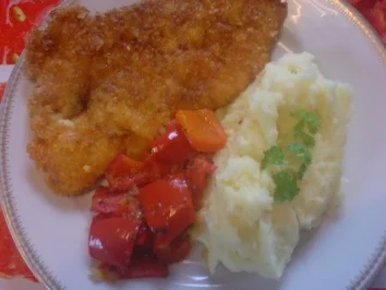 Rezept: Paprika-Putenschnitzel mit knuspriger Chips-Panade Paprika-Putenschnitzel mit knuspriger Chips-Panade - Rezept