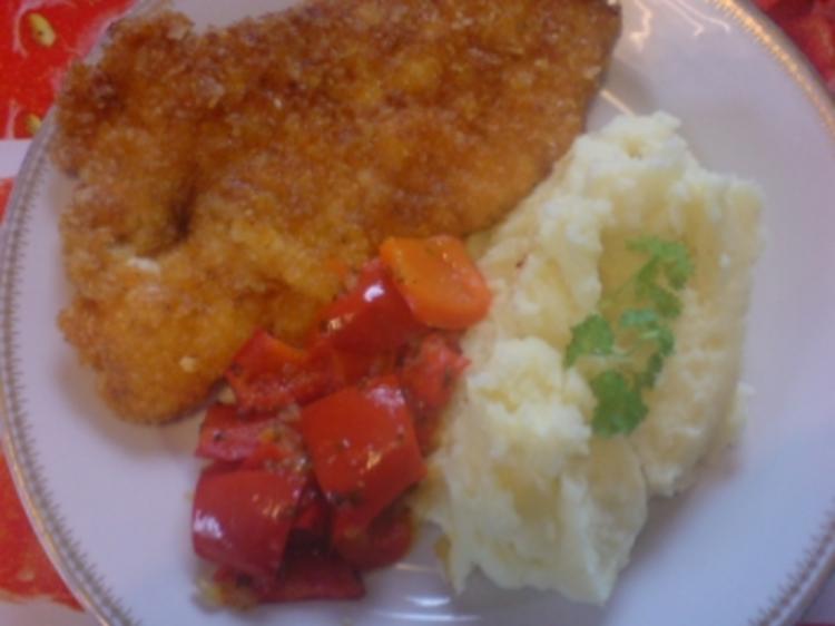 Paprika-Putenschnitzel mit knuspriger Chips-Panade - Rezept - kochbar.de