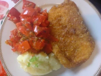 Rezept: Paprika-Putenschnitzel mit knuspriger Chips-Panade Paprika-Putenschnitzel mit knuspriger Chips-Panade - Rezept