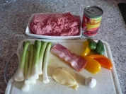 Pikante Cevapcici mit Zwiebelsoße und Tomatenreis - Rezept