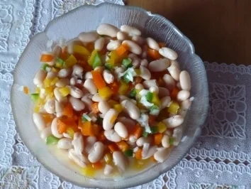 Pikante Cevapcici mit Zwiebelsoße und Tomatenreis - Rezept