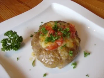 Rezept: Hackfleischnester mit Gouda und Tomaten Hackfleischnester mit Gouda und Tomaten - Rezept