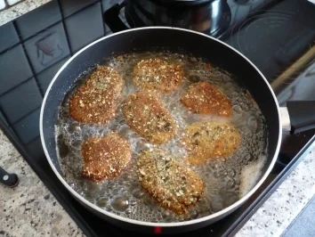 Rezept: Schweinsmedaillons in Kürbiskernpanade Schweinsmedaillons in Kürbiskernpanade - Rezept