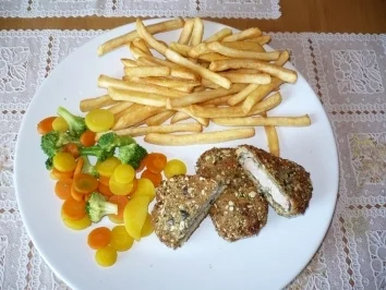 Rezept: Schweinsmedaillons in Kürbiskernpanade Schweinsmedaillons in Kürbiskernpanade - Rezept