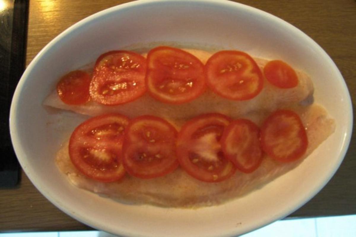 Gebackener Fisch in Kräutern - Rezept mit Bild - kochbar.de