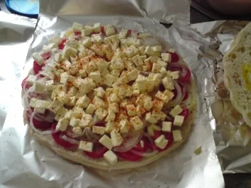 Gefülltes Fladenbrot mit Tomaten und Schafskäse - Rezept