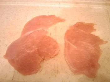 Putenbrust-Rolladen mit Frischkäse und Kräuter füllung - Rezept