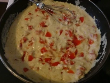 Spaghetti mit Käsesoße und Kräutertomaten - Rezept