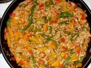 Putenschnitzel natur mit feurigem Gemüsereis - Rezept