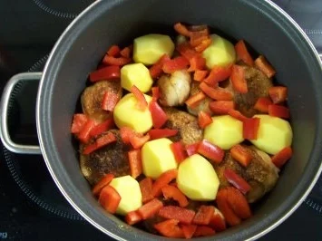 Geschmorte Hähnchenkeulen - Rezept