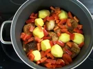 Geschmorte Hähnchenkeulen - Rezept