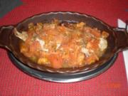 Fischfilet gebacken mit Tomaten...(griechisch) - Rezept