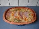 Kassler mit Apfel-Möhren-Kraut aus dem Römertopf - Rezept