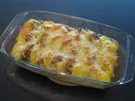 Schweinefilet im Kartoffelgratinbett - Rezept