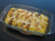Schweinefilet im Kartoffelgratinbett - Rezept