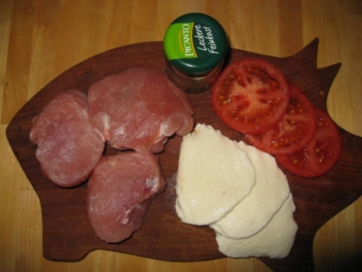 Medaillons vom Schwein mit Tomate &Mozzarella überbacken - Rezept