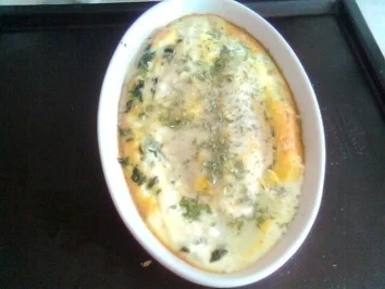 Silkes Pengasiusfilet auf Blattspinat mit einer Kräuter-Créme Fraîche Sauce - Rezept