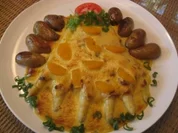 Überbackener frischer Spargel mit Orangenhollandaise & neuen gebräunten Drillingen - Rezept