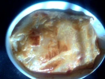 Rezept: Silkes Blätterrolle gefüllt mit Hackfleisch und Blumenkohl sowie einigen geschälten Tomaten Silkes Blätterrolle gefüllt mit Hackfleisch und Blumenkohl sowie einigen geschälten Tomaten - Rezept