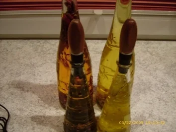 Chili - Öl , Pfeffer - Öl , Lorbeer - Zwiebel - Öl , Knoblauch - Öl - Rezept