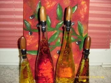 Chili - Öl , Pfeffer - Öl , Lorbeer - Zwiebel - Öl , Knoblauch - Öl - Rezept