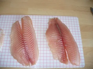 Saltimbocca von Tilapiafilet in Weißweinsauce mit Kartoffelwürfeln und Speckbohnen - Rezept - Bild Nr. 2