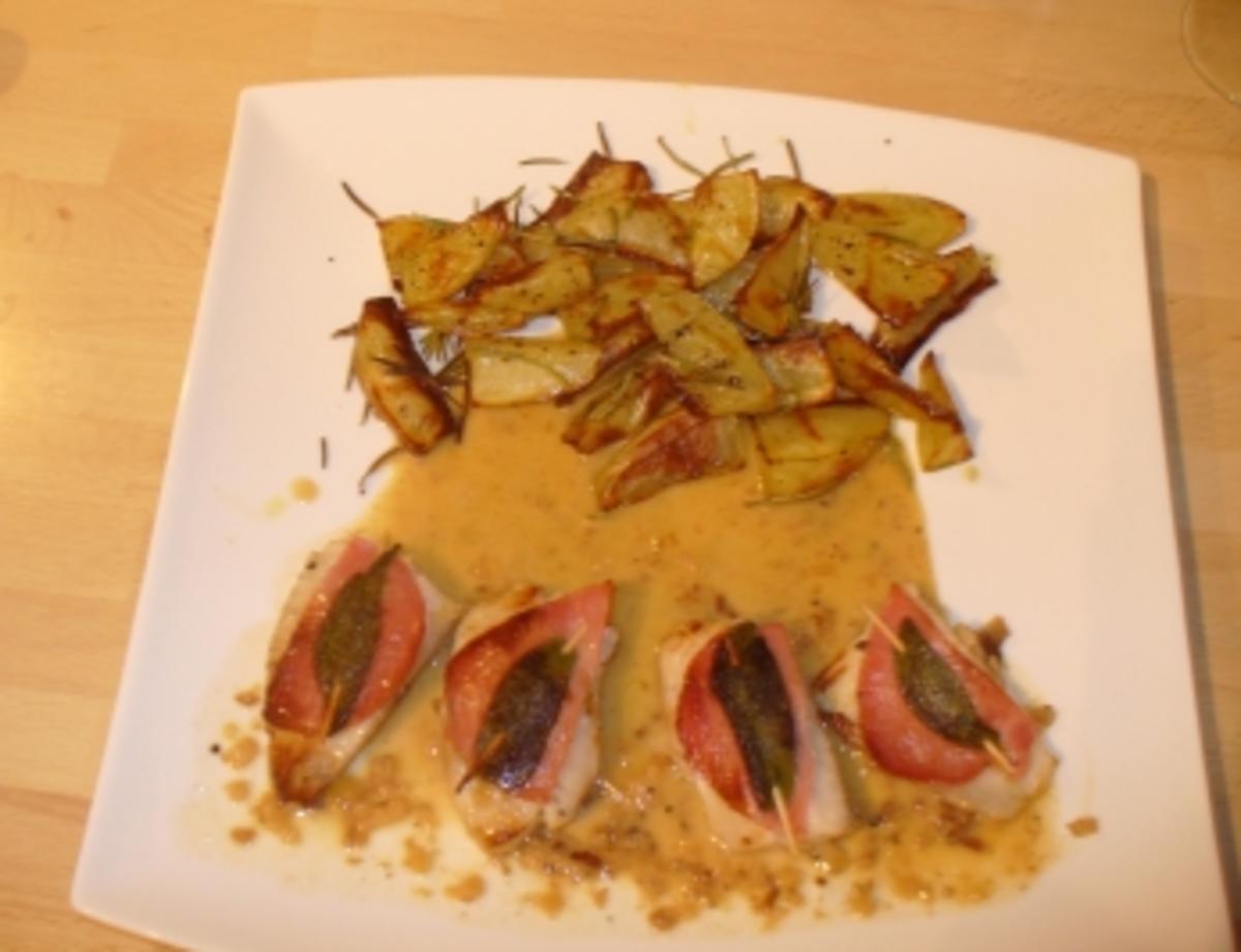 Saltimbocca von Tilapiafilet in Weißweinsauce mit Kartoffelwürfeln und Speckbohnen - Rezept