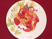 Biskuitrolle mit Fruchtfüllung auf Himbeersoße - Rezept