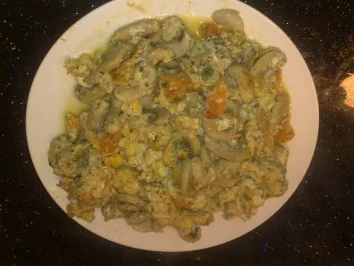 Rüherei mit Tomaten und Pilzen - Rezept