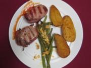 Schweinelende in Speck gewickelt mit Knoblauch-Parmesan-Kartoffeln - Rezept